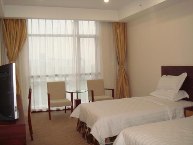 Neighbourhood Holiday Hotel Suzhou Su-čou Pokoj fotografie